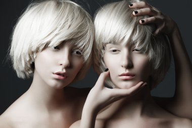 girls with fashion make up and white wigs