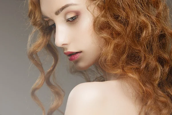 Girl  with red curly hair — Stock Photo, Image