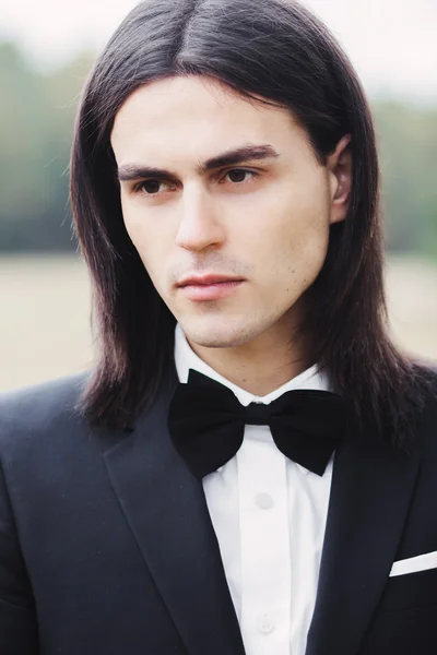 Young man in a suit — Stock Photo, Image