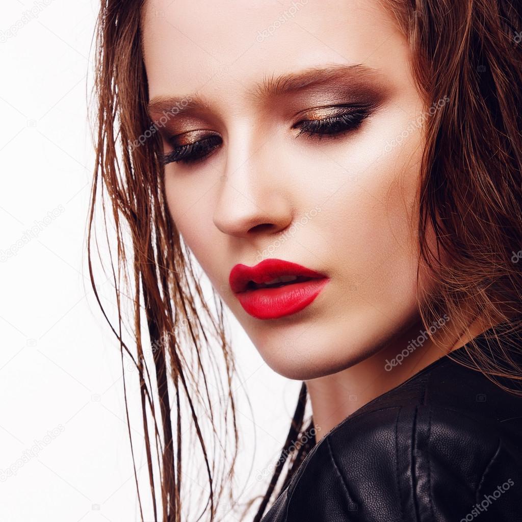 girl with bright make-up  in a rock style