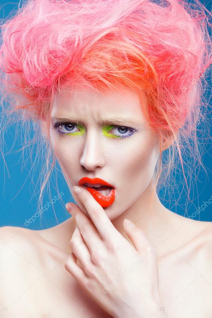 model with pink hair  and bright make up