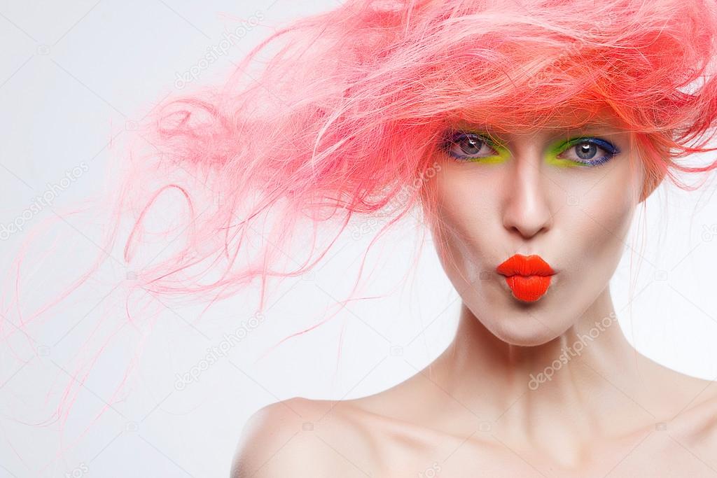 model with pink hair  and bright make up
