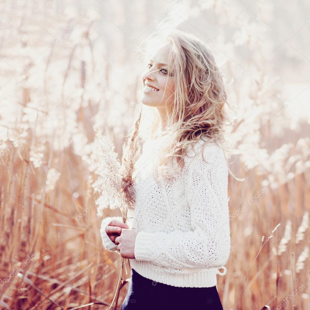 blonde girl in a field