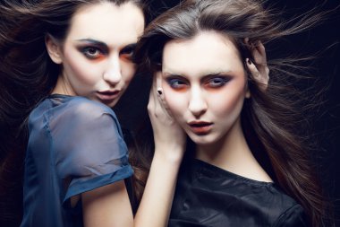 two beautiful young girls twins