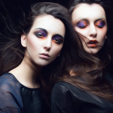 two beautiful young girls twins