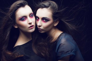 two beautiful young girls twins