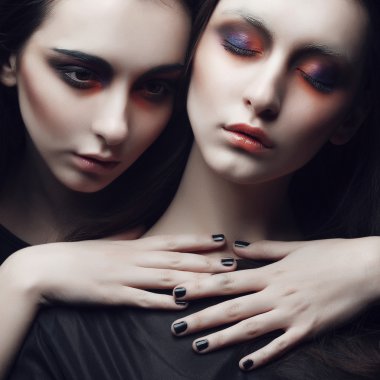 two beautiful young girls twins