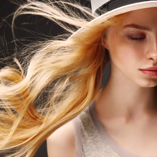 Beautiful blonde woman in hat — Stock Photo, Image