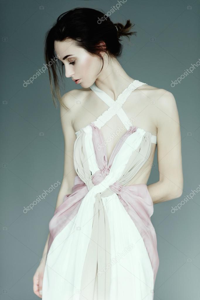 Girl in a light pink dress