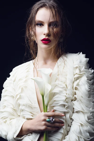 Young girl with flowers — Stock Photo, Image