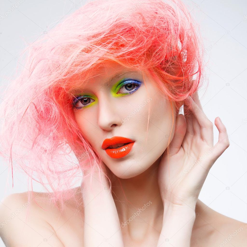 Girl with pink hair and orange lips