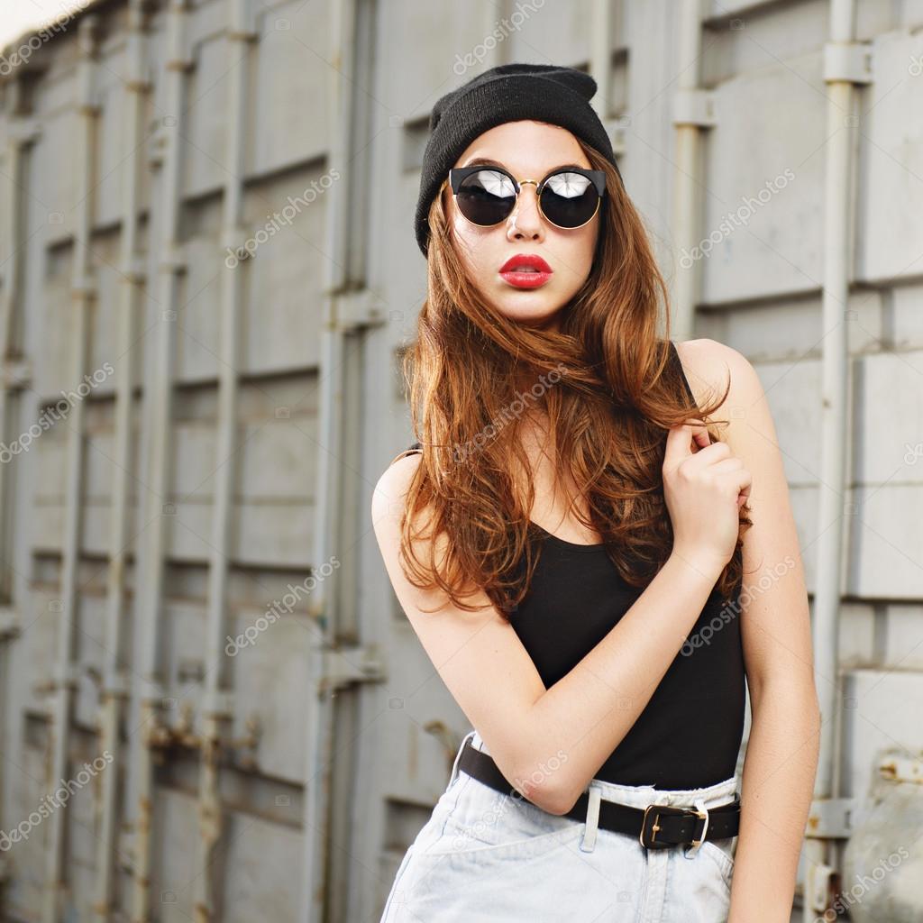 Girl in sunglasses and hat Stock Photo by ©Yafimik 81990220