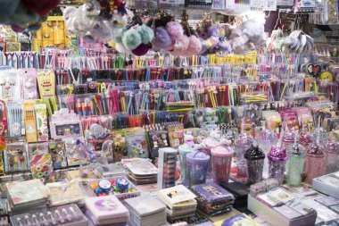 Divisoria, Manila, Philippines - Nov 2020: Pens, diaries and other accessories aimed at young girls on display at a shop found inside 168 mall. Shopping in Divisoria. clipart