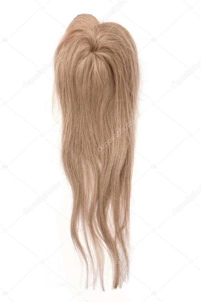A light blond long wavy wig or hair topper on a white background.