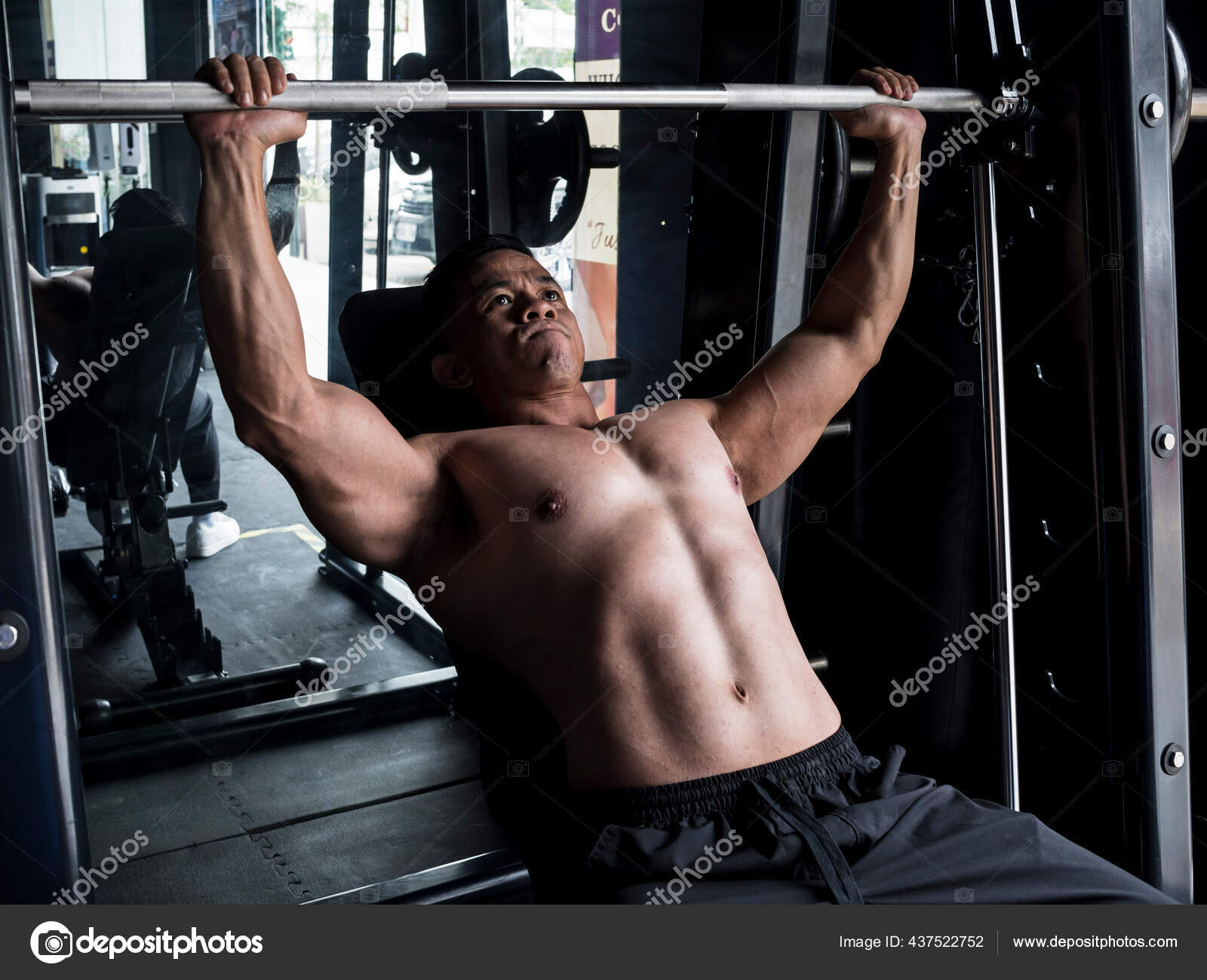 Muscular Asian Man Performs Incline Bench Presses Smith Machine Gym Stock Photo MikeEdwards 437522752