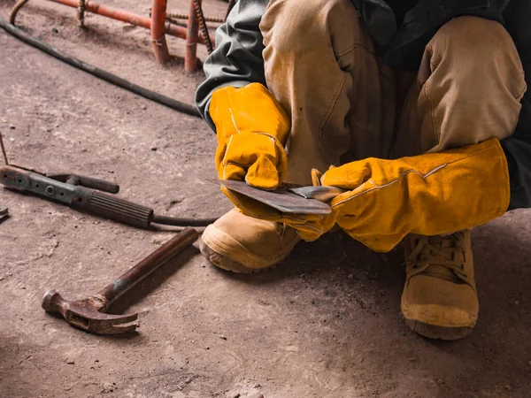 Man Inspects Makeshift Scraper Putty Knife Created Onsite Leftover Metal — Stock Photo, Image