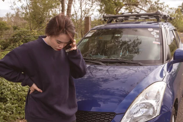 Asian Woman Listens Depressing News While Parking Her Car Side — Stock Photo, Image