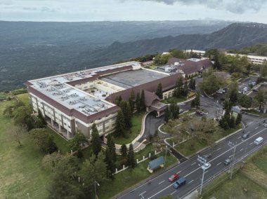 Tagaytay, Cavite, Philippines - Jan 2021: Aerial of Taal Vista Hotel, a 4 star hotel at the heart of the city with views of Taal Volcano.