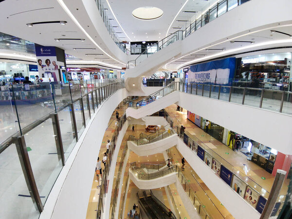 Quezon City, Metro Manila, Philippines - The atrium area of SM North EDSA, with a beautiful spiral staircase in the center.