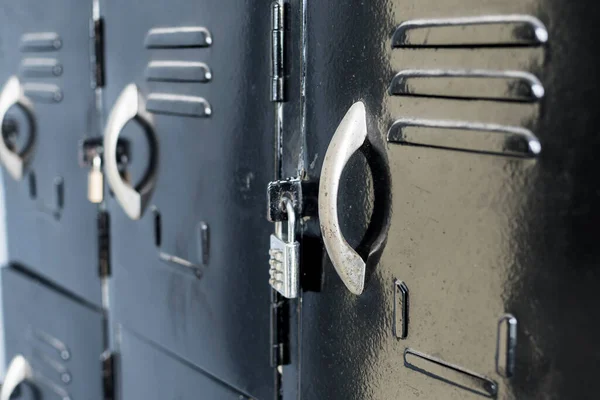 Closeup of a locker room with number coded locks at a gym or fitness center