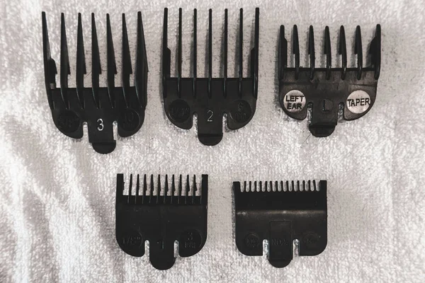 Various Black Hair Clipper Comb Guide Attachments Electric Hair Clippers — Stock Photo, Image