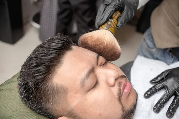 Barber Brushes Baby Powder His Customer Face Haircut Upscale Barbershop — Stock Photo, Image