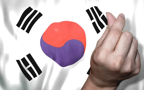 Flag of Korea and Finger heart symbol. Symbol of victory and love. Soft power of country.