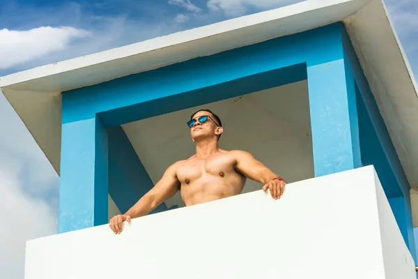 Asian Lifeguard Top Tall Watch Tower Surveying Beach Safety Tourist — Stock Photo, Image