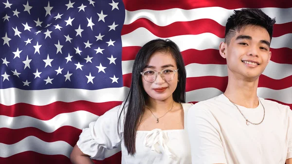 Proud and young Asian Americans, 18-24 age range, with USA flag as background.