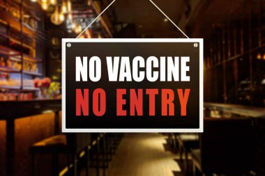 No Vaccine No Entry Sign at a bar, tavern or pub. Proof or vaccination required to enter a shop or business establishment. clipart