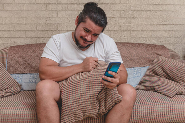 A silly and jobless man child or immature male addicted all day on social media or playing games.