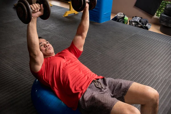 Fit Athletic Asian Guy Does Stability Ball Dumbbell Chest Press — Stock Photo, Image