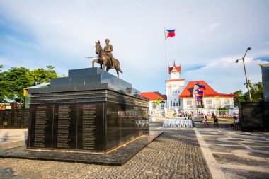 Kawit, Cavite, Philippines - June 2017: Aguinaldo Shrine and the statue of Emilio Aguinaldo. clipart