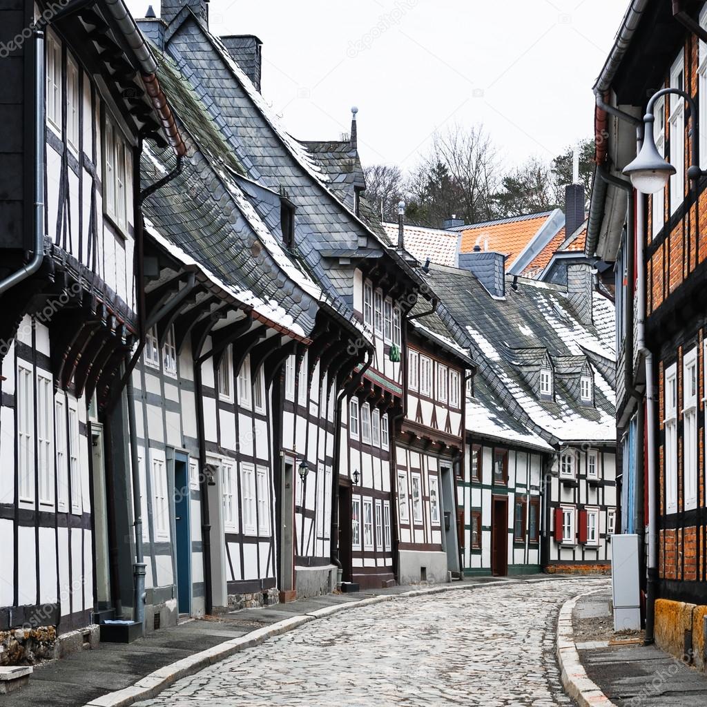 Street with half-timbered houses in winter in Goslar, Harz, Germany
