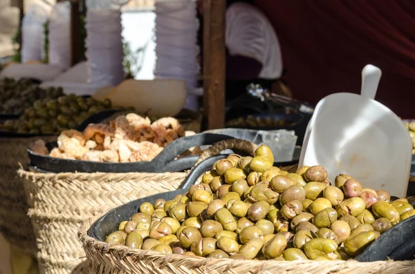 Bowl of olives for sale at market — Stock Photo, Image