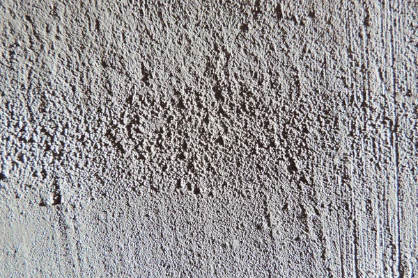 Beton, çimento ve küçük taşların karışımından yapılmış pis gri alçı dokusu. duvar dokusu arkaplanı.          
