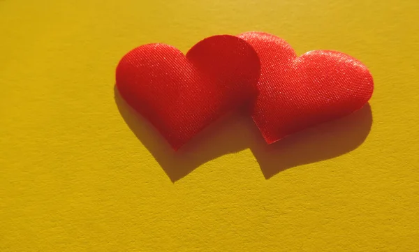 Two Red Hearts Dark Yellow Textured Cardboard Surface Valentine Hearts — Stock Photo, Image