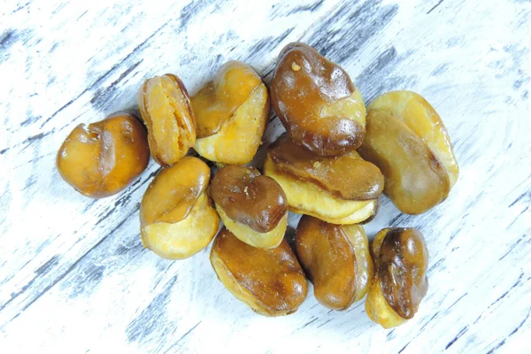 beans fried with garlic, a savory snack  , selective   focus