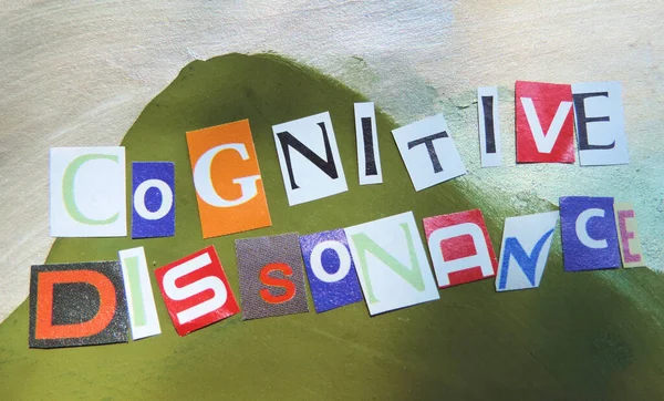 cut out colored letters from magazines and compilation of cognitive dissonance