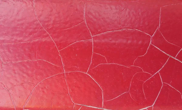 Металлическая Поверхность Треснувшей Красной Краской — стоковое фото