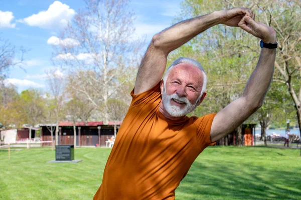 Happy Energetic Senior Retired Man Stretching Park Doing Side Bends — Stock Photo, Image