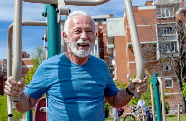 Happy Exhausted Senior Man Exercises Public Gym Equipment Open Air — Stock Photo, Image