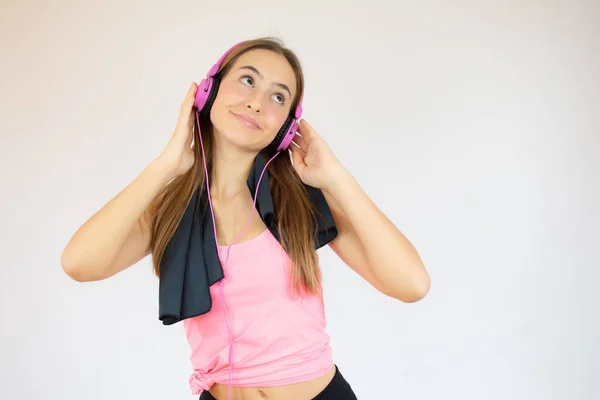 Image Beautiful Young Sports Woman Isolated Indoors Towel Neck Listening — Stock Photo, Image