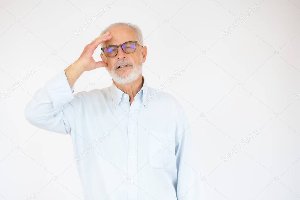 Handsome middle age senior man with grey hair over isolated white background Thinking worried about a question
