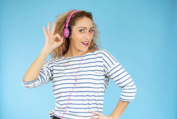 Beautiful Woman Headphones Listening Music Blue Background — Stock Photo, Image
