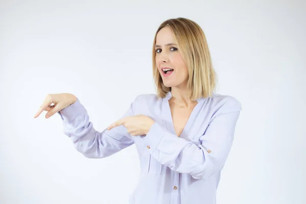 Excited Woman Wearing Casual Shirt Pointing Fingers Side Isolated Portrait — Stock Photo, Image