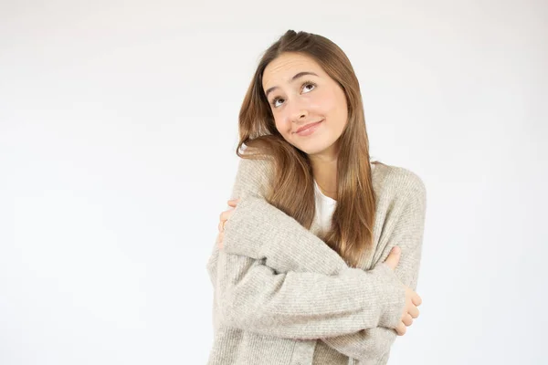 Young Beautiful Woman Wearing Sweater White Isolated Background Hugging Oneself — Stockfoto