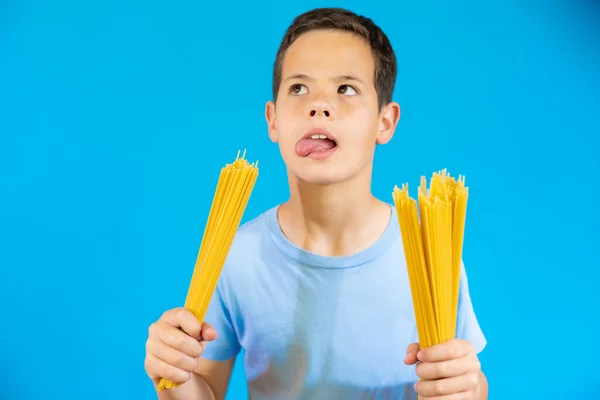 Cute Smiling Boy Holding Traditional Italian Spaghetti His Hands — Stock Fotó