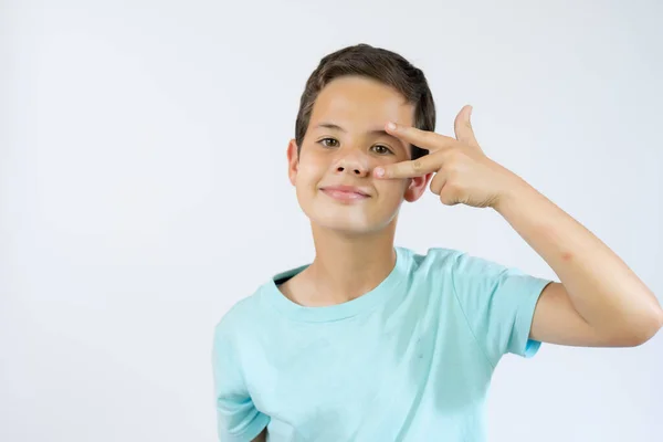 Portrait Little Boy Showing Victory Hand Sign White Background — Stock Photo, Image