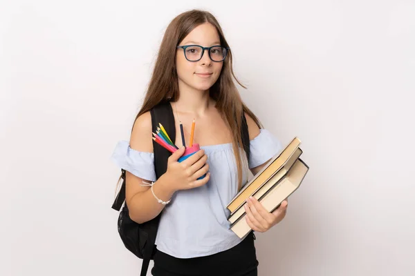 Porträt Einer Lächelnden Teenagerin Mit Rucksack Und Büchern Auf Weißem — Stockfoto
